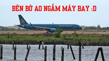 Quay m&aacute;y bay b&ecirc;n bờ ao ở Cam Ranh.
